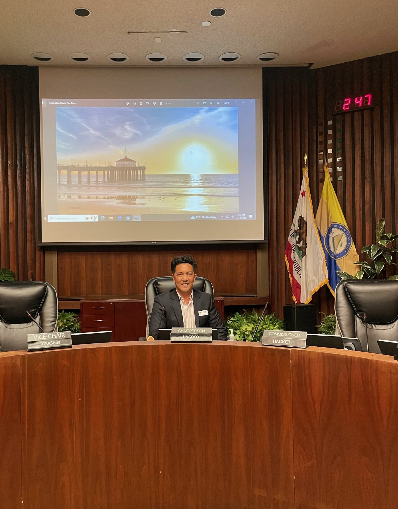 Joseph Ungoco seated as Chairperson at the Manhattan Beach City Council dais