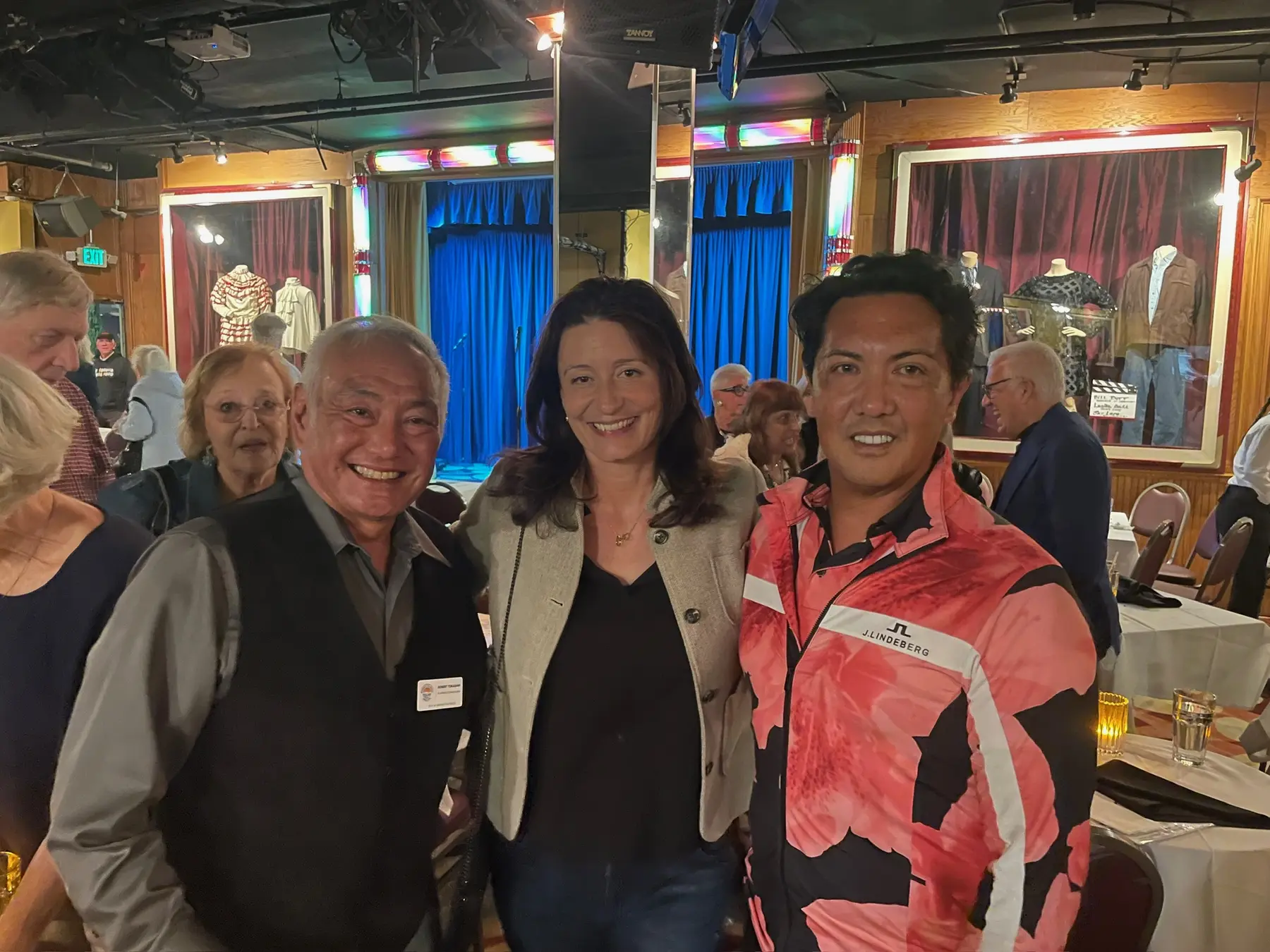 Joseph Ungoco with community members at a local gathering
